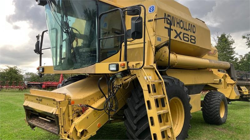 New Holland TX68 FSH - Máy gặt đập: hình 1 New Holland TX68 FSH - Máy gặt đập: hình 1