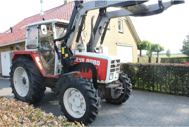Steyr 8080 met voorlader 40 kmh - Máy cày: hình 1 Steyr 8080 met voorlader 40 kmh - Máy cày: hình 1