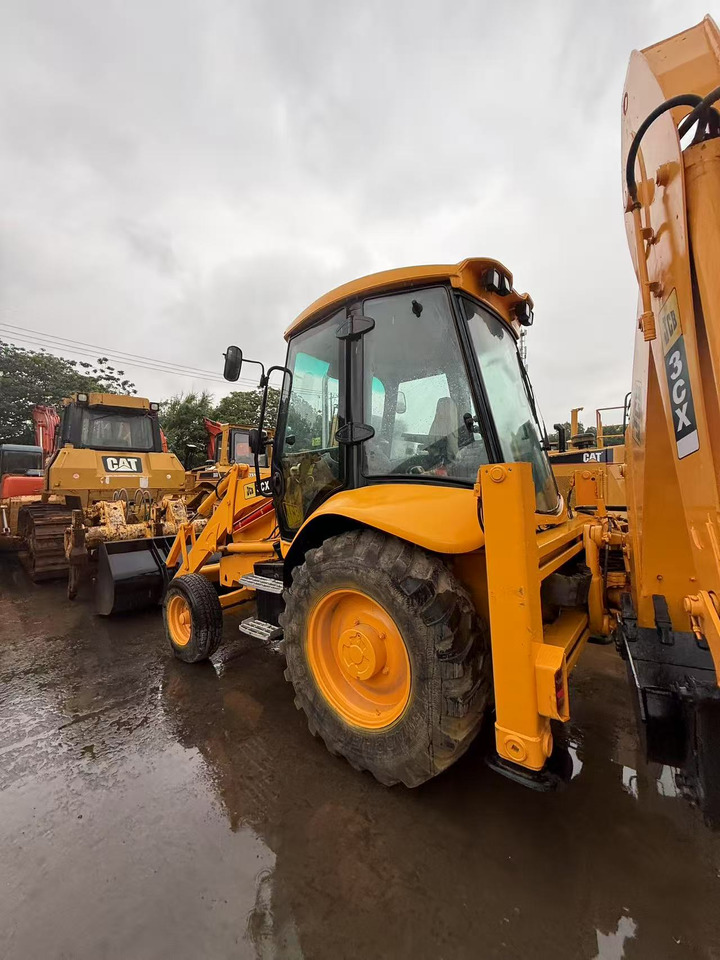 JCB 3CX - Máy xúc bánh lốp: hình 1 JCB 3CX - Máy xúc bánh lốp: hình 1