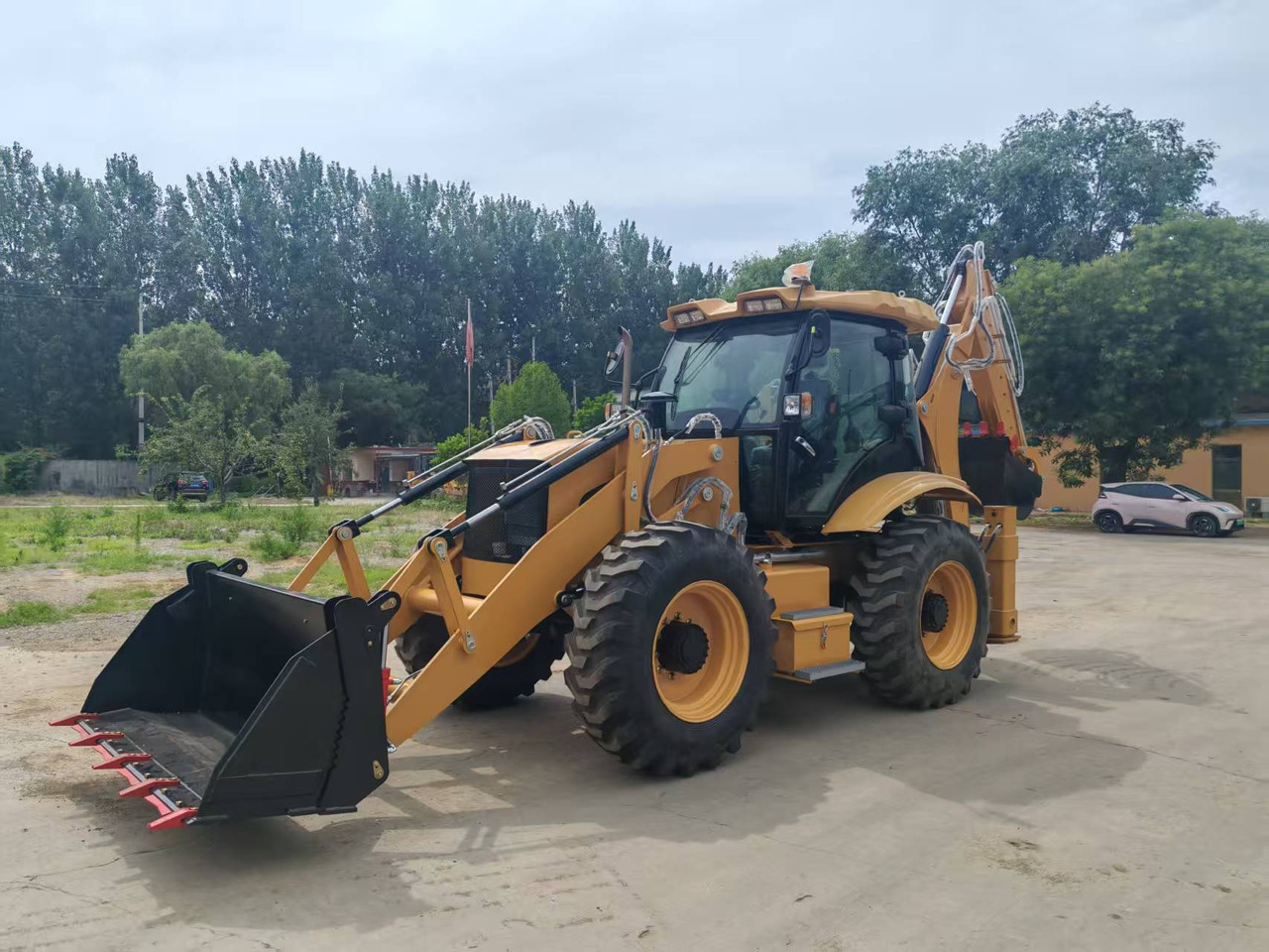 CATERPILLAR ZY-388 - Máy xúc trước múc sau: hình 3 CATERPILLAR ZY-388 - Máy xúc trước múc sau: hình 3