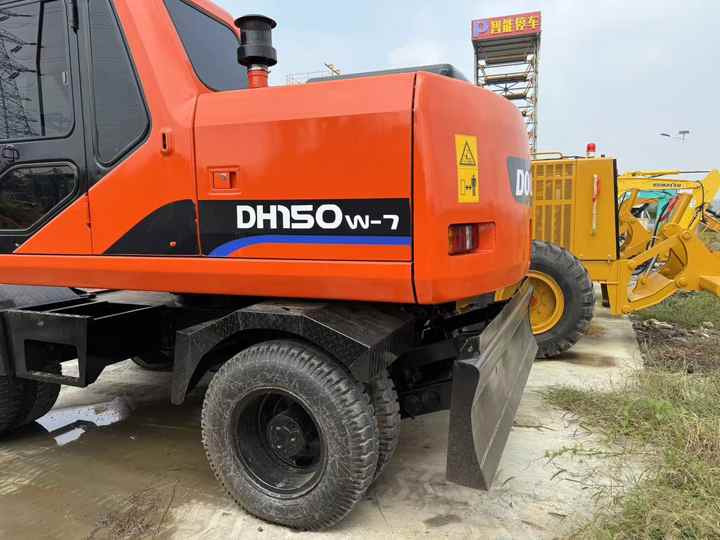 90% Brand New Doosan Brand Dh150w-7 Wheel Excavator in Stock Used Korea Brand Doosan Dh55 Dh60 Dh150 Dh210 Excavator for Sale - Máy xúc bánh lốp: hình 4 90% Brand New Doosan Brand Dh150w-7 Wheel Excavator in Stock Used Korea Brand Doosan Dh55 Dh60 Dh150 Dh210 Excavator for Sale - Máy xúc bánh lốp: hình 4