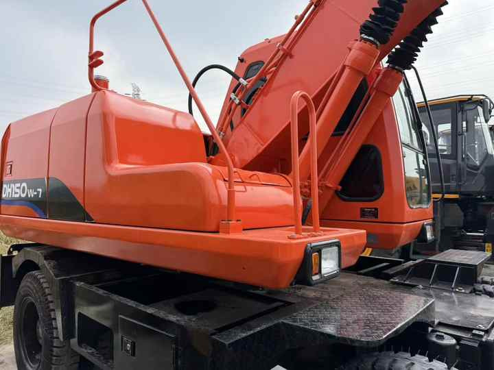 90% Brand New Doosan Brand Dh150w-7 Wheel Excavator in Stock Used Korea Brand Doosan Dh55 Dh60 Dh150 Dh210 Excavator for Sale - Máy xúc bánh lốp: hình 5 90% Brand New Doosan Brand Dh150w-7 Wheel Excavator in Stock Used Korea Brand Doosan Dh55 Dh60 Dh150 Dh210 Excavator for Sale - Máy xúc bánh lốp: hình 5