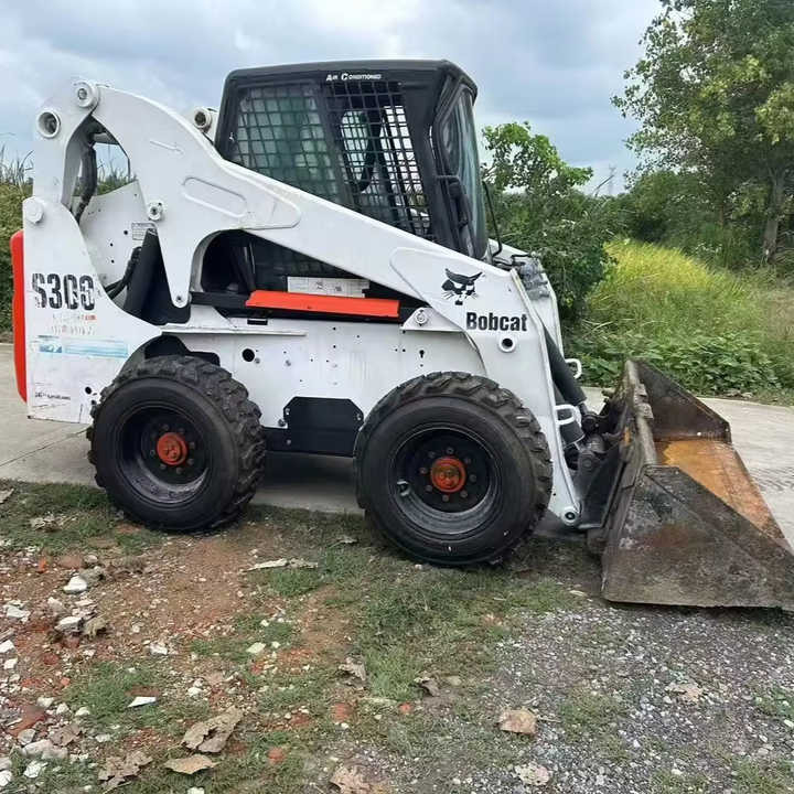 USED BOBCAT S300 Skid-steer Loader with Very Good Performance Is for Sale at a Low Price. S160/s185/s220/330 in Stock - Máy xúc lật đa năng: hình 1 USED BOBCAT S300 Skid-steer Loader with Very Good Performance Is for Sale at a Low Price. S160/s185/s220/330 in Stock - Máy xúc lật đa năng: hình 1