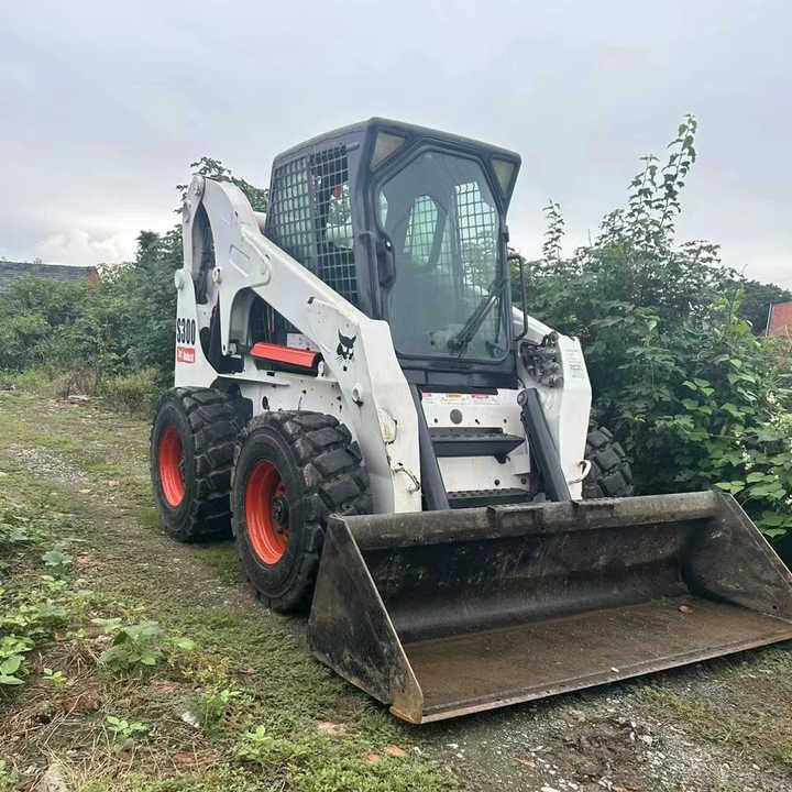 Used Bob Cat Bob Cat S300 Used Skid Steer Wheel Loader Multifunctional Track Loaders Bobcat - Máy xúc lật đa năng: hình 5 Used Bob Cat Bob Cat S300 Used Skid Steer Wheel Loader Multifunctional Track Loaders Bobcat - Máy xúc lật đa năng: hình 5