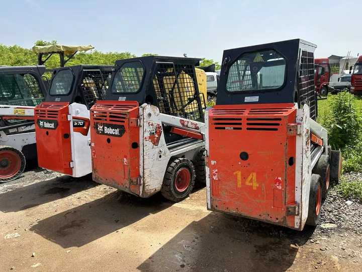 Used Bobcat S70 Skid Teer in Stock Good Condition bobcat S70 S160 185 300 330 Skid Steer for Sale - Máy xúc lật đa năng: hình 4 Used Bobcat S70 Skid Teer in Stock Good Condition bobcat S70 S160 185 300 330 Skid Steer for Sale - Máy xúc lật đa năng: hình 4