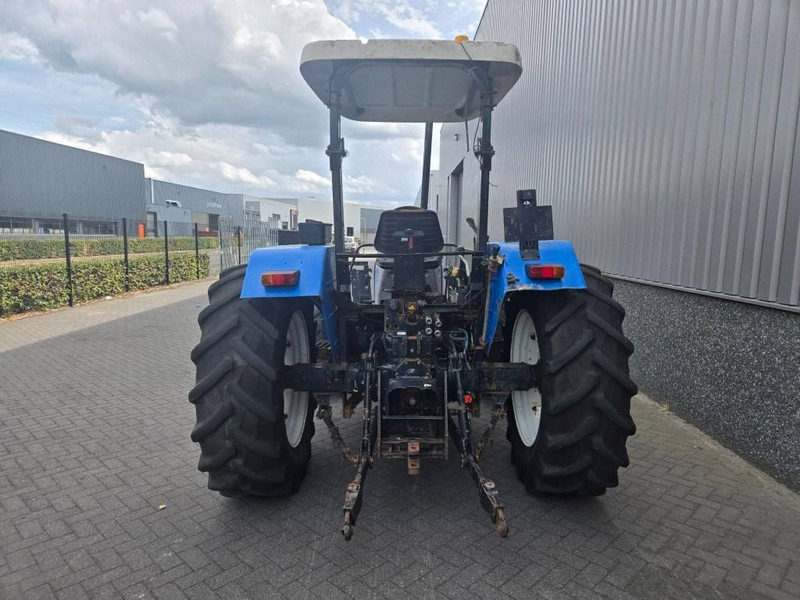 New Holland TL 90 A - Máy cày: hình 4 New Holland TL 90 A - Máy cày: hình 4