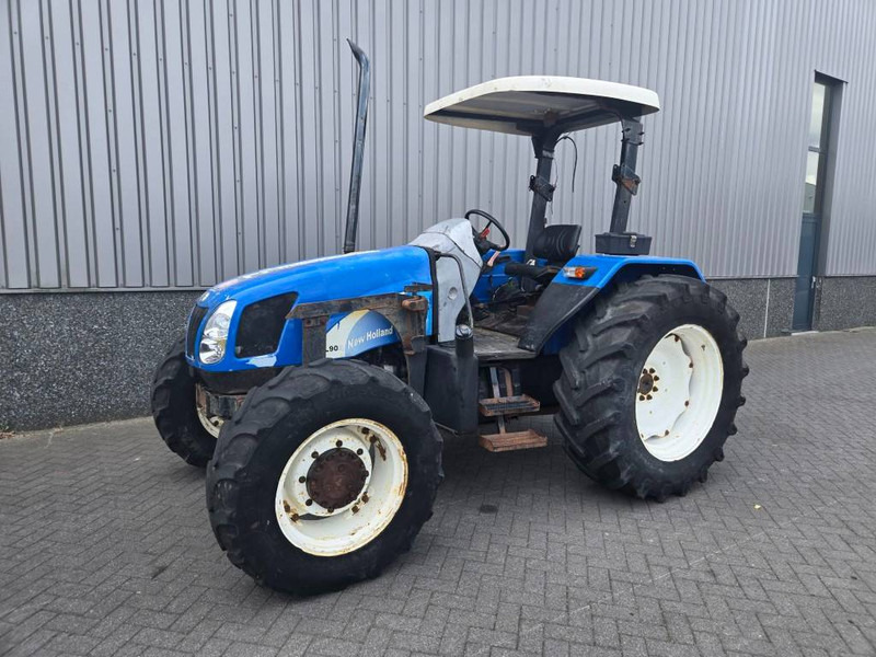 New Holland TL 90 A - Máy cày: hình 1 New Holland TL 90 A - Máy cày: hình 1