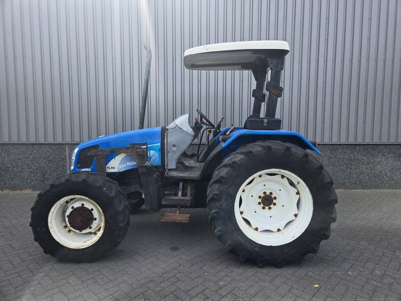 New Holland TL 90 A - Máy cày: hình 2 New Holland TL 90 A - Máy cày: hình 2