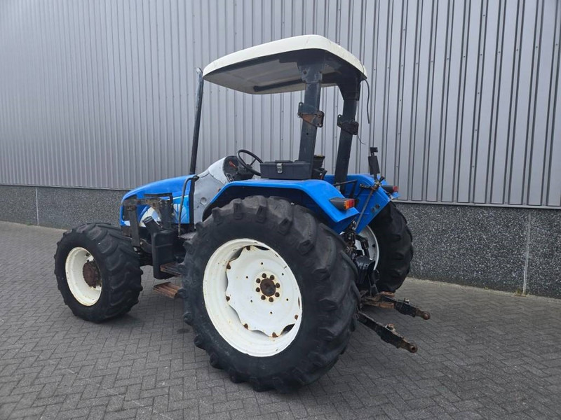 New Holland TL 90 A - Máy cày: hình 3 New Holland TL 90 A - Máy cày: hình 3