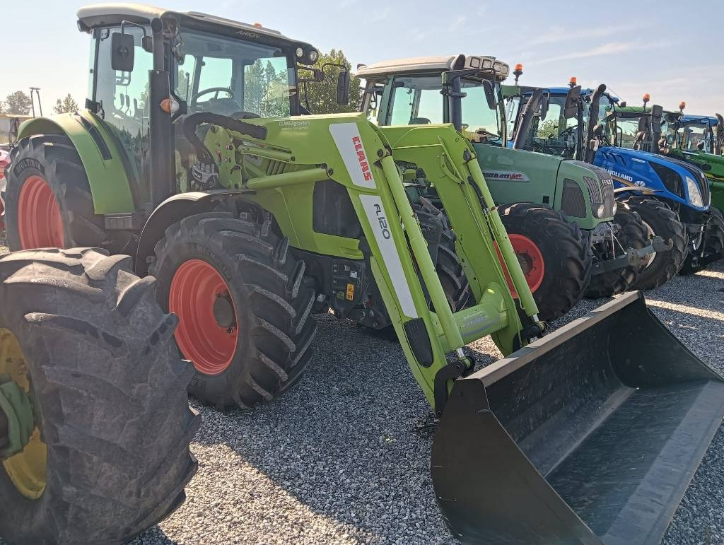 Claas Arion 460 - Máy cày: hình 1 Claas Arion 460 - Máy cày: hình 1