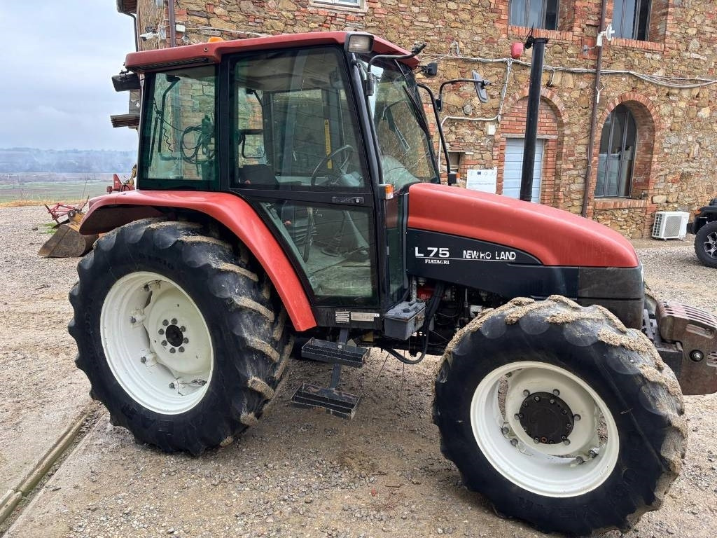 New Holland L 75 - Máy cày: hình 1 New Holland L 75 - Máy cày: hình 1