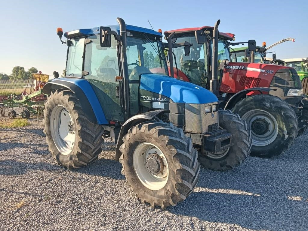 New Holland TS 100 - Máy cày: hình 1 New Holland TS 100 - Máy cày: hình 1
