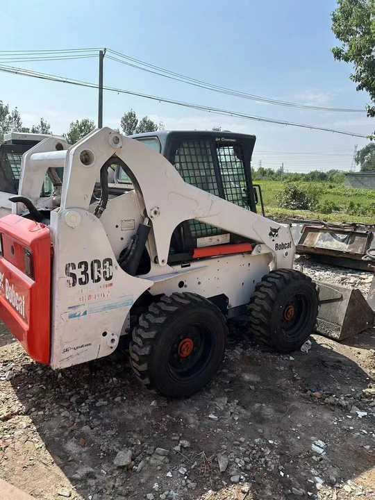 Used Bob Cat Bob Cat S300 Used Skid Steer Wheel Loader Multifunctional Track Loaders Bobcat - Máy xúc lật bánh lốp: hình 3 Used Bob Cat Bob Cat S300 Used Skid Steer Wheel Loader Multifunctional Track Loaders Bobcat - Máy xúc lật bánh lốp: hình 3