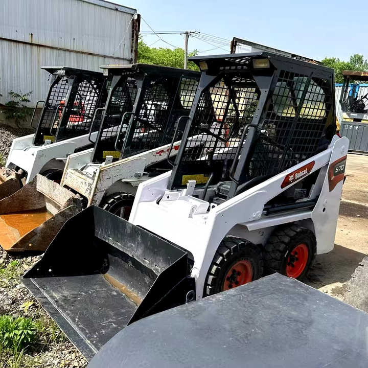 Used Bobcat S70 Skid Teer in Stock Good Condition bobcat S70 S160 185 300 330 Skid Steer for Sale - Máy xúc lật đa năng: hình 1 Used Bobcat S70 Skid Teer in Stock Good Condition bobcat S70 S160 185 300 330 Skid Steer for Sale - Máy xúc lật đa năng: hình 1