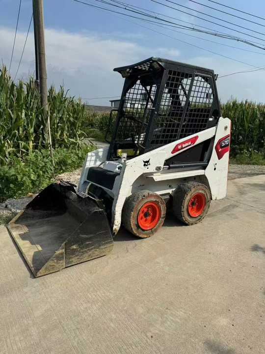 Used Bobcat S70 Skid Teer in Stock Good Condition bobcat S70 S160 185 300 330 Skid Steer for Sale - Máy xúc lật đa năng: hình 2 Used Bobcat S70 Skid Teer in Stock Good Condition bobcat S70 S160 185 300 330 Skid Steer for Sale - Máy xúc lật đa năng: hình 2