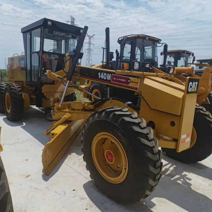 Used Japan Imported Caterpillar 140M Cat 140m Motor Grader with Good Quality and Low Price for Sale - Máy xúc: hình 1 Used Japan Imported Caterpillar 140M Cat 140m Motor Grader with Good Quality and Low Price for Sale - Máy xúc: hình 1