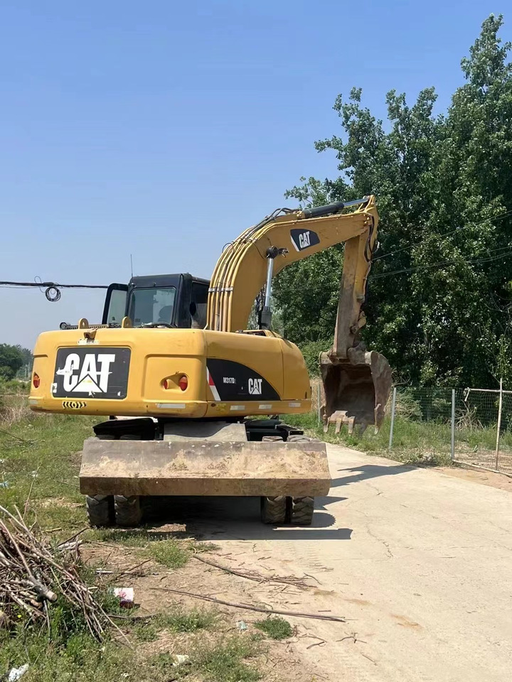 CATERPILLAR M317 - Máy xúc bánh lốp: hình 2 CATERPILLAR M317 - Máy xúc bánh lốp: hình 2