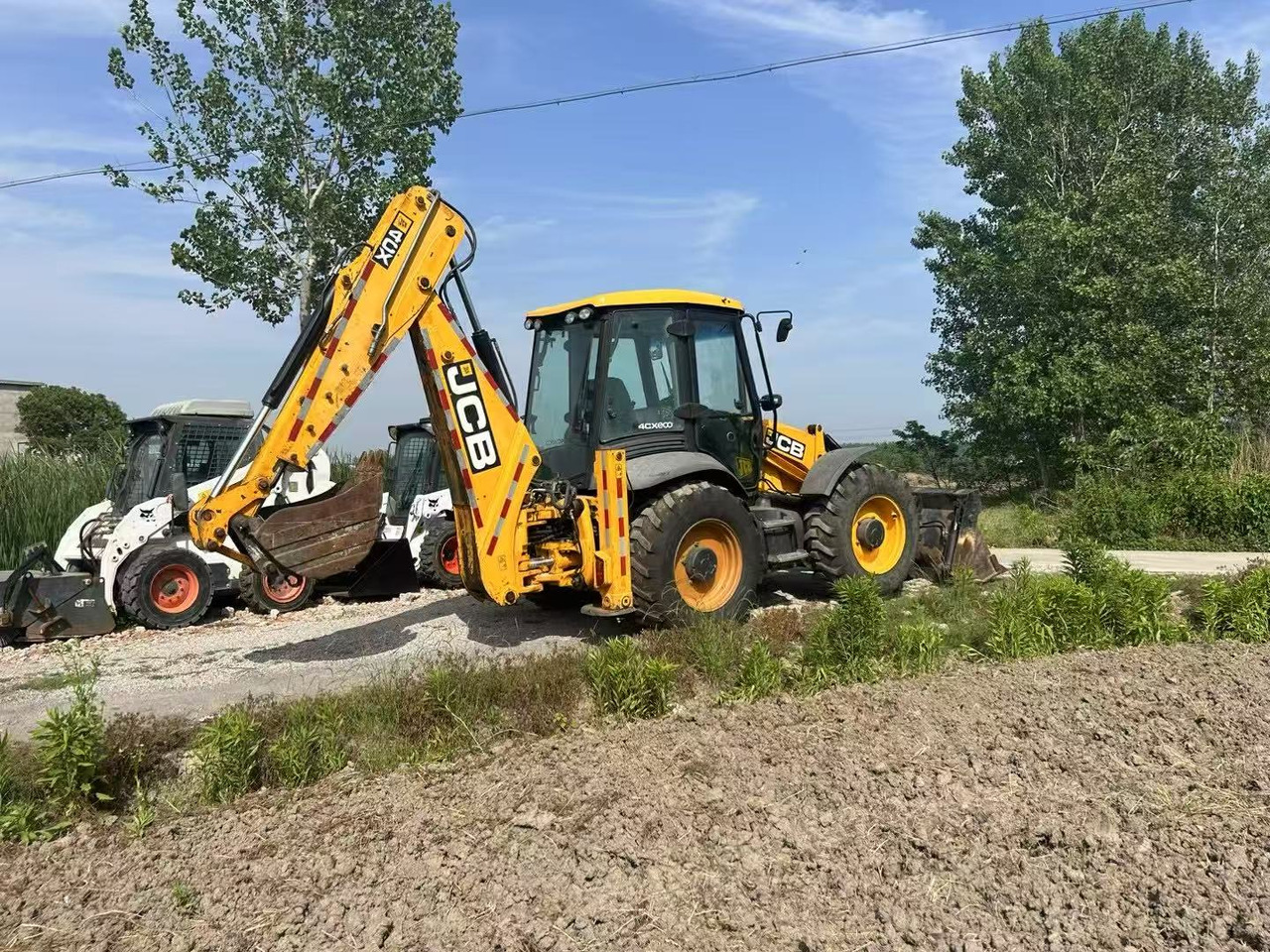 JCB 4CX - Máy xúc trước múc sau: hình 3 JCB 4CX - Máy xúc trước múc sau: hình 3