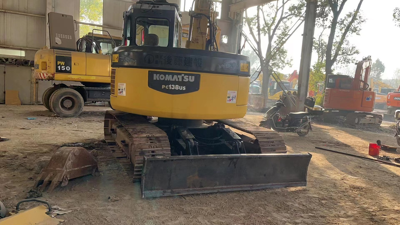 KOMATSU PC138US - Máy xúc bánh xích: hình 2 KOMATSU PC138US - Máy xúc bánh xích: hình 2