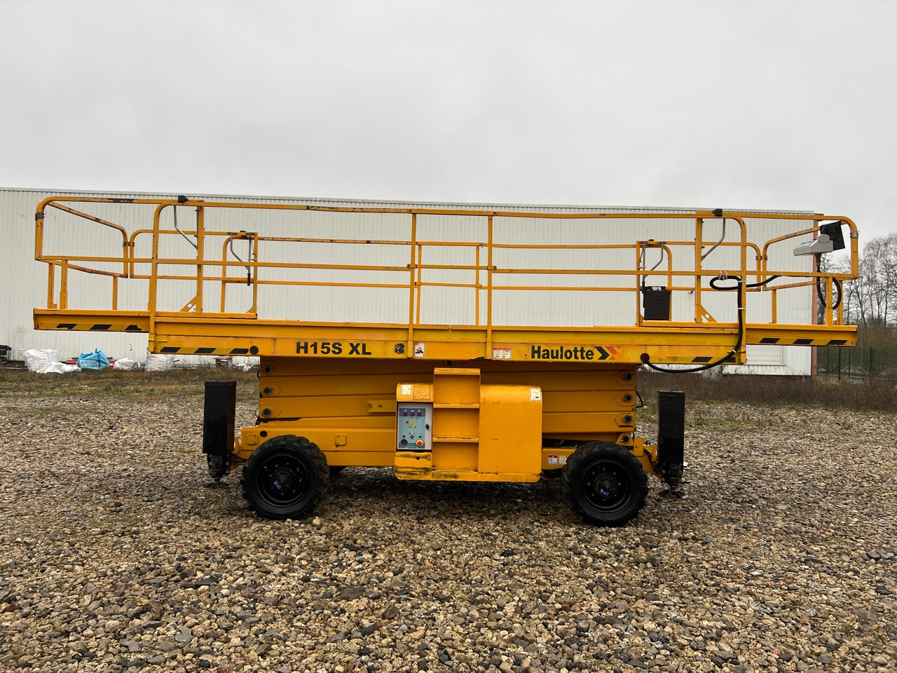 HAULOTTE H15SXL - Máy nâng người hình kéo: hình 1 HAULOTTE H15SXL - Máy nâng người hình kéo: hình 1