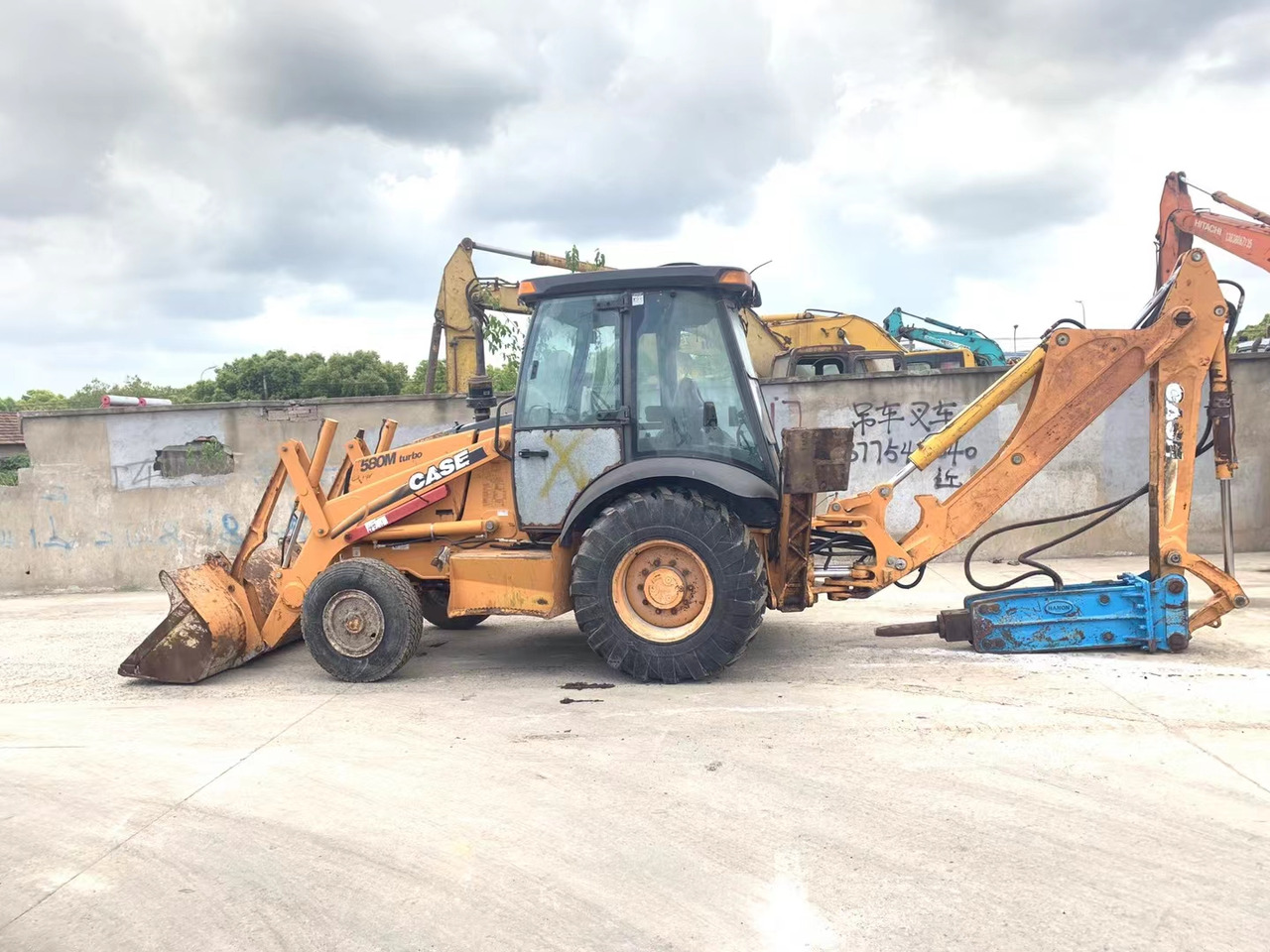CASE 580M - Máy xúc trước múc sau: hình 3 CASE 580M - Máy xúc trước múc sau: hình 3