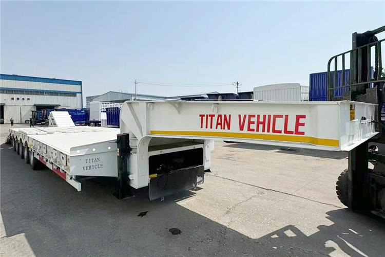 TITAN 5 Axle 100 Ton Low Bed Trailer for Sale In Tanzania - Sơ mi rơ moóc thùng thấp: hình 5 TITAN 5 Axle 100 Ton Low Bed Trailer for Sale In Tanzania - Sơ mi rơ moóc thùng thấp: hình 5