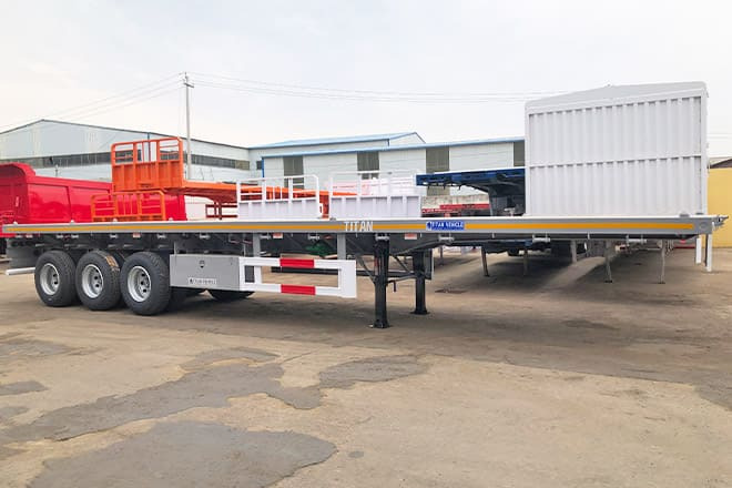 TITAN Tri Axle 40Ft Flatbed Trailer Price for Sale in Sierra Leone - Sơ mi rơ moóc thùng lửng/ Phẳng: hình 5 TITAN Tri Axle 40Ft Flatbed Trailer Price for Sale in Sierra Leone - Sơ mi rơ moóc thùng lửng/ Phẳng: hình 5