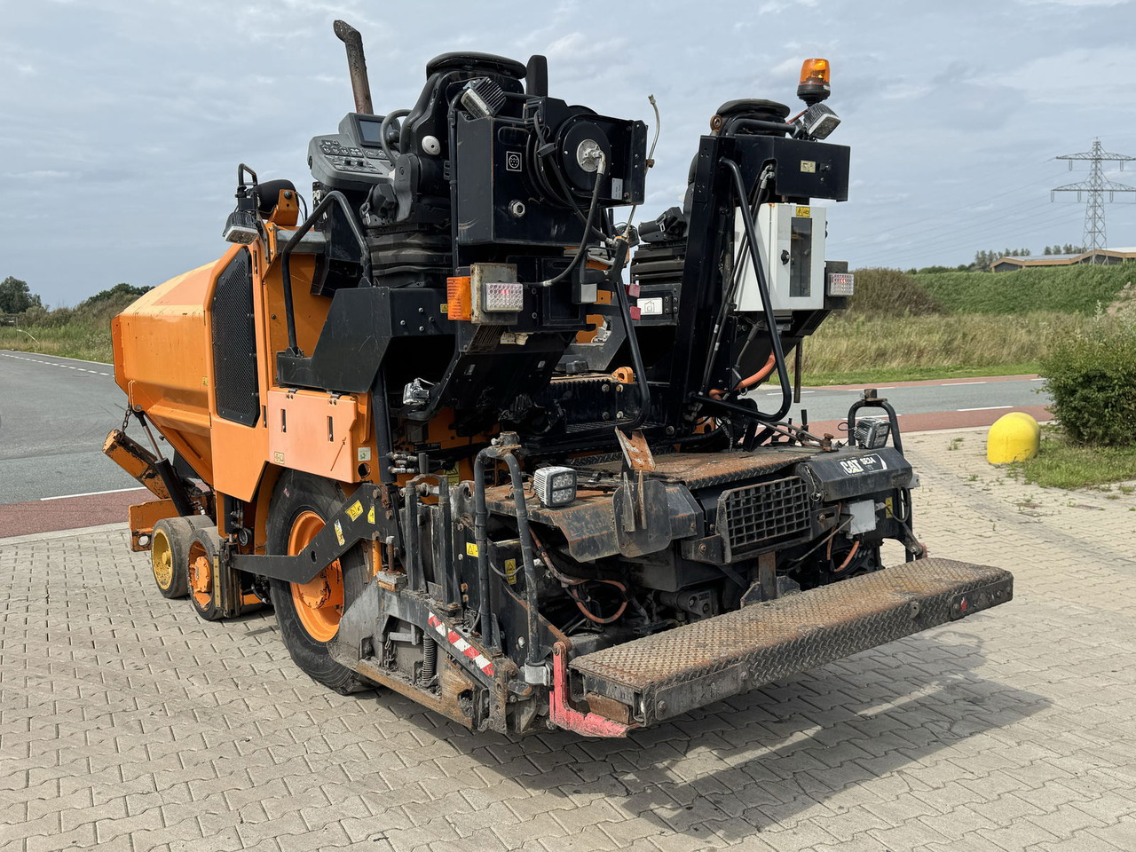 Caterpillar AP300F - Máy lát nhựa đường: hình 4 Caterpillar AP300F - Máy lát nhựa đường: hình 4