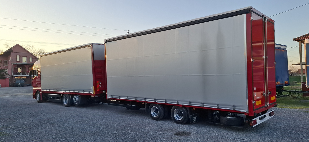 Xe tải thùng mui bạt MAN TGX 26.440 E6 + SCHMITZ: hình 7 Xe tải thùng mui bạt MAN TGX 26.440 E6 + SCHMITZ: hình 7