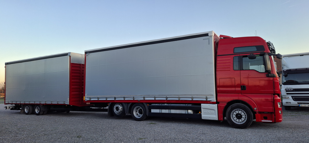 Xe tải thùng mui bạt MAN TGX 26.440 E6 + SCHMITZ: hình 30 Xe tải thùng mui bạt MAN TGX 26.440 E6 + SCHMITZ: hình 30