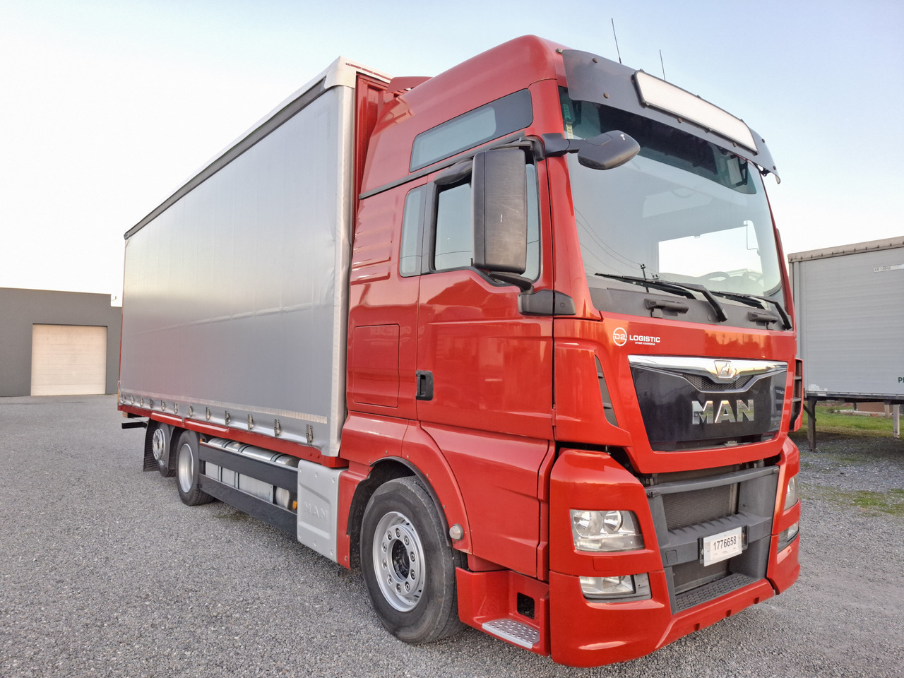 MAN TGX 26.440 E6 - Xe tải thùng mui bạt: hình 1 MAN TGX 26.440 E6 - Xe tải thùng mui bạt: hình 1
