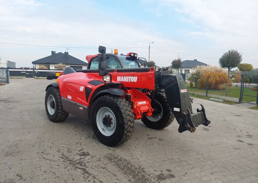 Manitou 1335 - Xe nhấc hình viễn vọng kính: hình 1 Manitou 1335 - Xe nhấc hình viễn vọng kính: hình 1