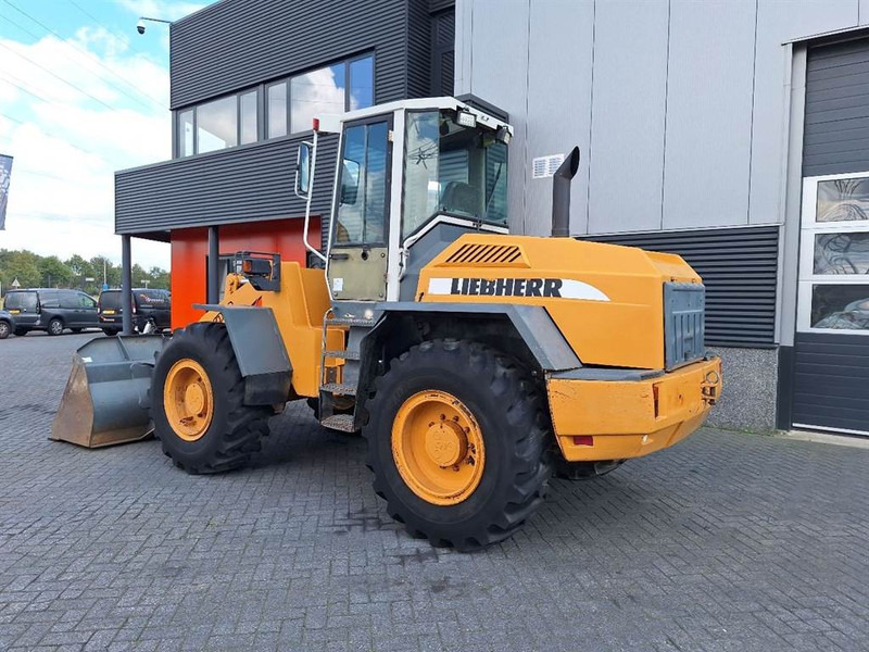 Liebherr L522 - Máy xúc lật bánh lốp: hình 2 Liebherr L522 - Máy xúc lật bánh lốp: hình 2