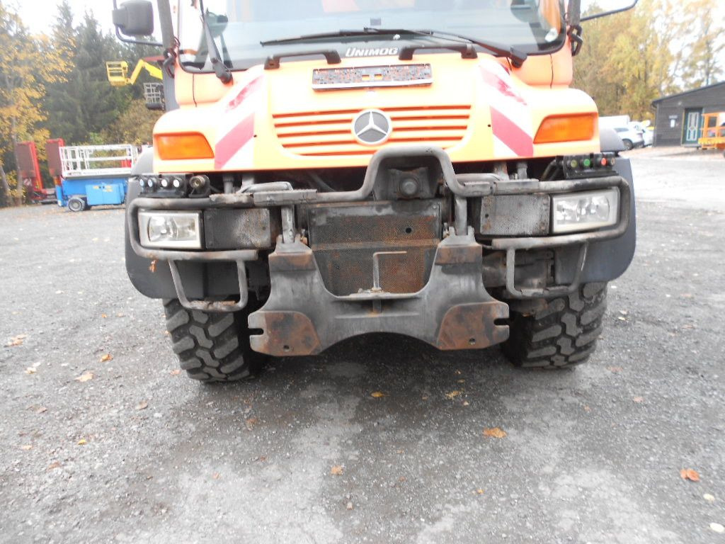 Unimog U400 mit Kran Palfinger PK11502 - Xe tải thùng lửng/ Phẳng, Xe cẩu tự hành: hình 5 Unimog U400 mit Kran Palfinger PK11502 - Xe tải thùng lửng/ Phẳng, Xe cẩu tự hành: hình 5
