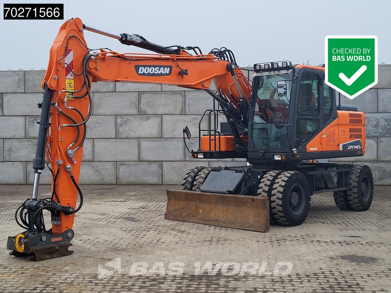 Doosan DX140 W-5 OIL QUICK - GERMAN - Máy xúc bánh lốp: hình 1 Doosan DX140 W-5 OIL QUICK - GERMAN - Máy xúc bánh lốp: hình 1
