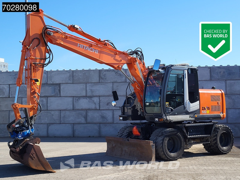 Hitachi ZX140W -3 - Máy xúc bánh lốp: hình 1 Hitachi ZX140W -3 - Máy xúc bánh lốp: hình 1