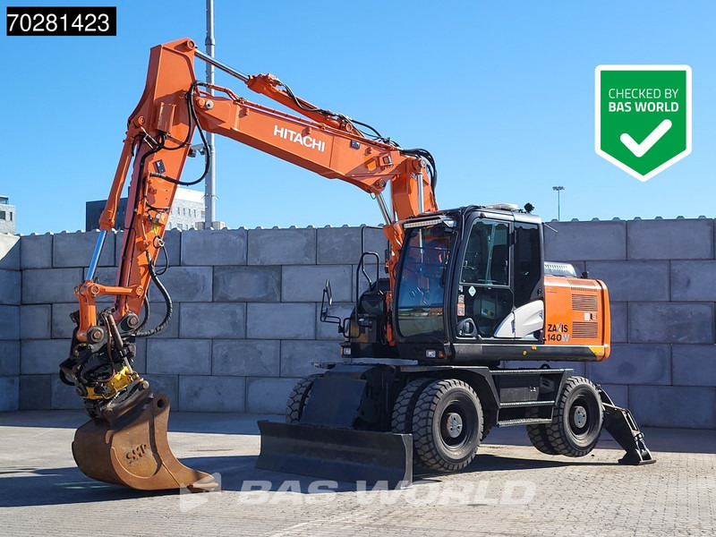 Hitachi ZX140W -5 OUTRIGGERS + BLADE - Máy xúc bánh lốp: hình 1 Hitachi ZX140W -5 OUTRIGGERS + BLADE - Máy xúc bánh lốp: hình 1