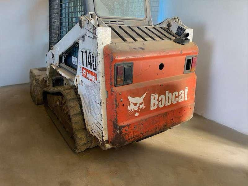 Bobcat T140 - Máy xúc lật mini bánh xích: hình 2 Bobcat T140 - Máy xúc lật mini bánh xích: hình 2