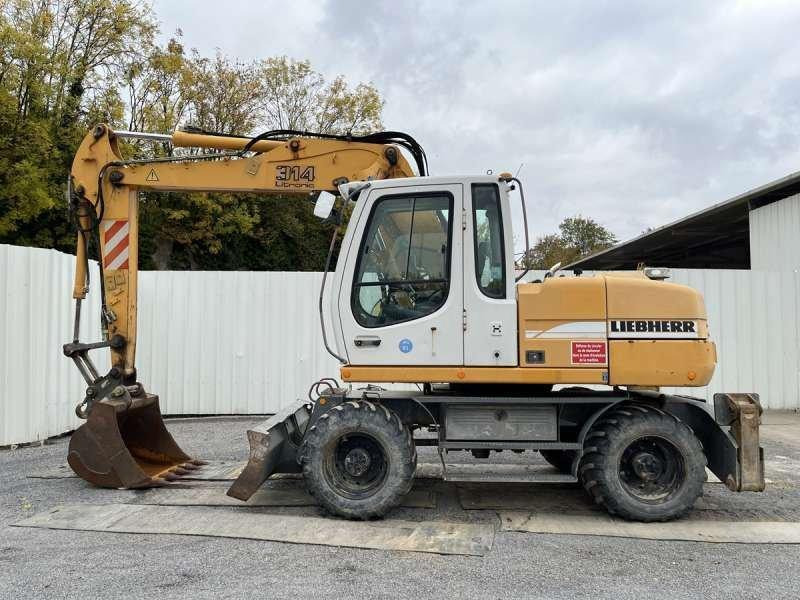 Liebherr A314 Litronic - Máy xúc bánh lốp: hình 3 Liebherr A314 Litronic - Máy xúc bánh lốp: hình 3