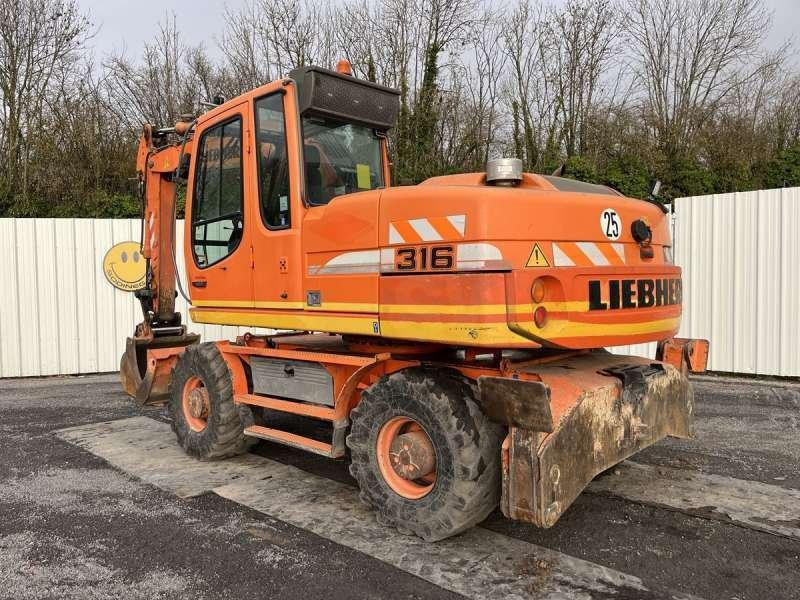 Liebherr A316 LITRONIC - Máy xúc bánh lốp: hình 4 Liebherr A316 LITRONIC - Máy xúc bánh lốp: hình 4