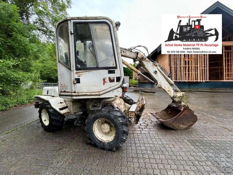 Mecalac 8CXI - Máy xúc bánh lốp: hình 1 Mecalac 8CXI - Máy xúc bánh lốp: hình 1