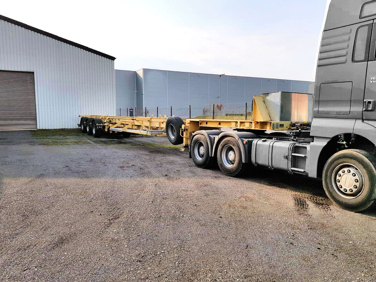 Goldhofer 3-Achs SPZ-DL3-38/80 Spezial 20,5meter + 3xLenk - Xe chở container/ Sơ mi rơ moóc hoán đổi thân: hình 1 Goldhofer 3-Achs SPZ-DL3-38/80 Spezial 20,5meter + 3xLenk - Xe chở container/ Sơ mi rơ moóc hoán đổi thân: hình 1