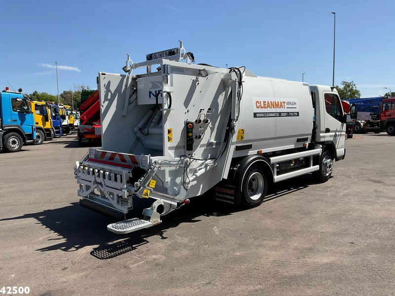 FUSO Canter Duonic 7C15 NTM 5m³ - Xe tải chở rác: hình 3 FUSO Canter Duonic 7C15 NTM 5m³ - Xe tải chở rác: hình 3
