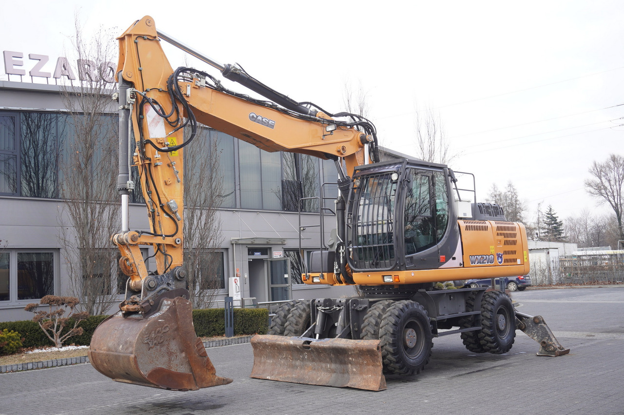 CASE WX218 / 23t wheeled excavator / 3 times folding arm - Máy xúc bánh lốp: hình 2 CASE WX218 / 23t wheeled excavator / 3 times folding arm - Máy xúc bánh lốp: hình 2