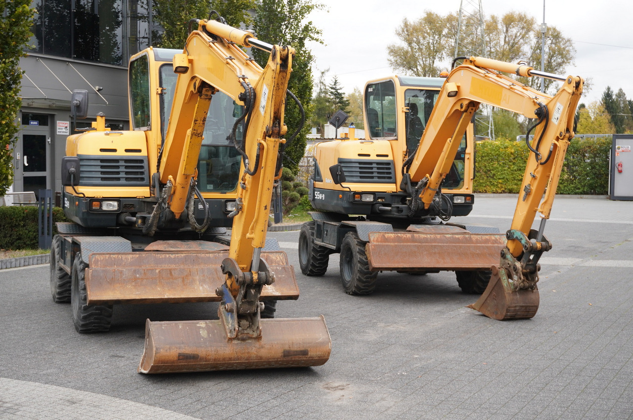 Hyundai Robex 55W-9 Wheeled Excavator 5.5t / 2pcs - Máy xúc mini: hình 5 Hyundai Robex 55W-9 Wheeled Excavator 5.5t / 2pcs - Máy xúc mini: hình 5