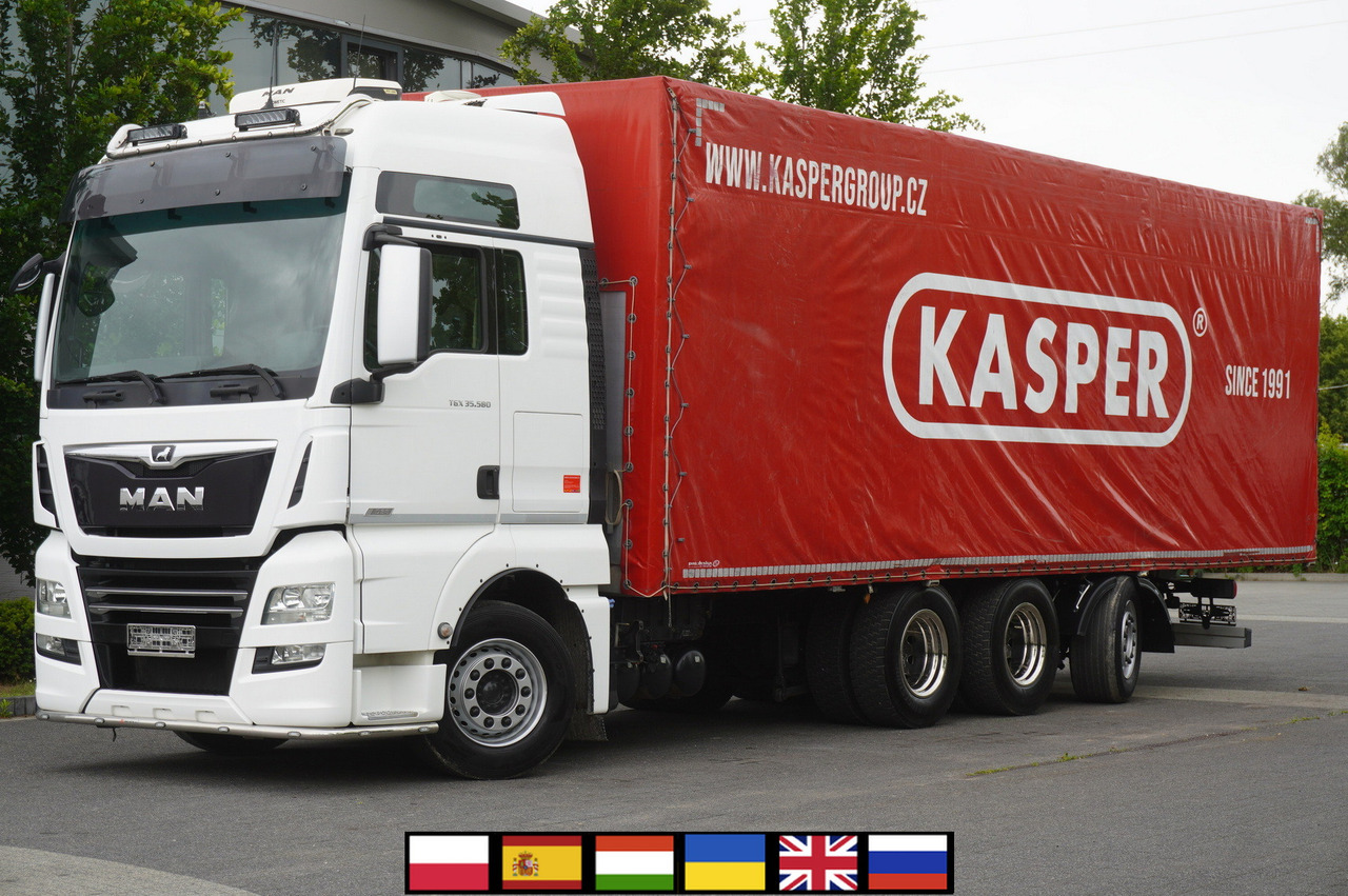 MAN MAN TGX 35.580 E6 8x4 /4 / 23 EPAL tarp superstructure / 4th axle steered - Xe tải thùng mui bạt: hình 1 MAN MAN TGX 35.580 E6 8x4 /4 / 23 EPAL tarp superstructure / 4th axle steered - Xe tải thùng mui bạt: hình 1