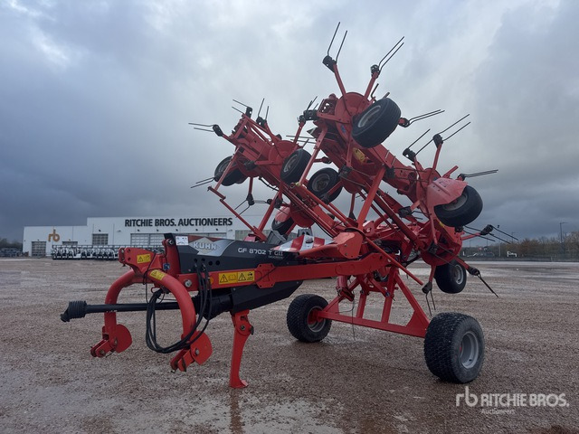 2013 Kuhn GF 8702 TG2 8.7 m Semi-Mount 8 Rotor Faneuse Hay Tedder - Dàn trải/ Cào: hình 1 2013 Kuhn GF 8702 TG2 8.7 m Semi-Mount 8 Rotor Faneuse Hay Tedder - Dàn trải/ Cào: hình 1