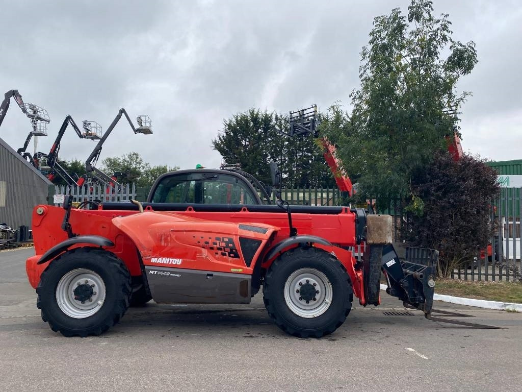 Manitou MT 1440 - Xe nhấc hình viễn vọng kính: hình 1 Manitou MT 1440 - Xe nhấc hình viễn vọng kính: hình 1