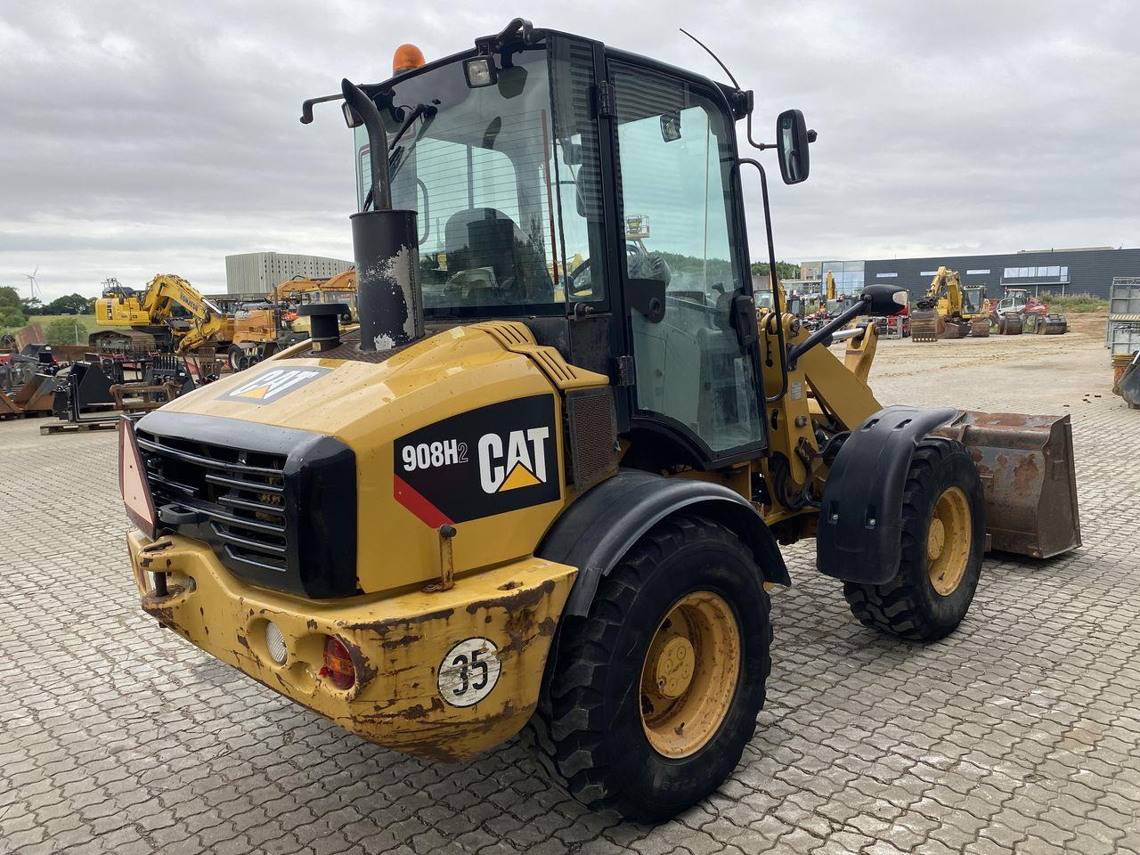 Caterpillar 908 H2 - Máy xúc lật mini gấp khúc: hình 4 Caterpillar 908 H2 - Máy xúc lật mini gấp khúc: hình 4