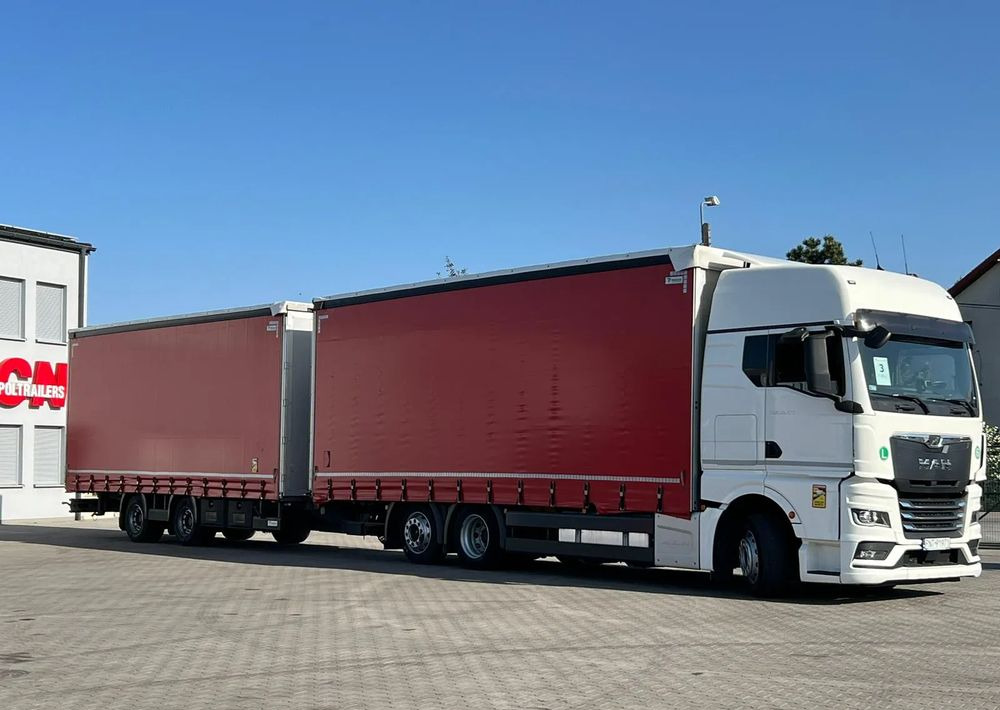 MAN TGX 26.470 z przyczepą Redos - Xe tải thùng mui bạt: hình 2 MAN TGX 26.470 z przyczepą Redos - Xe tải thùng mui bạt: hình 2